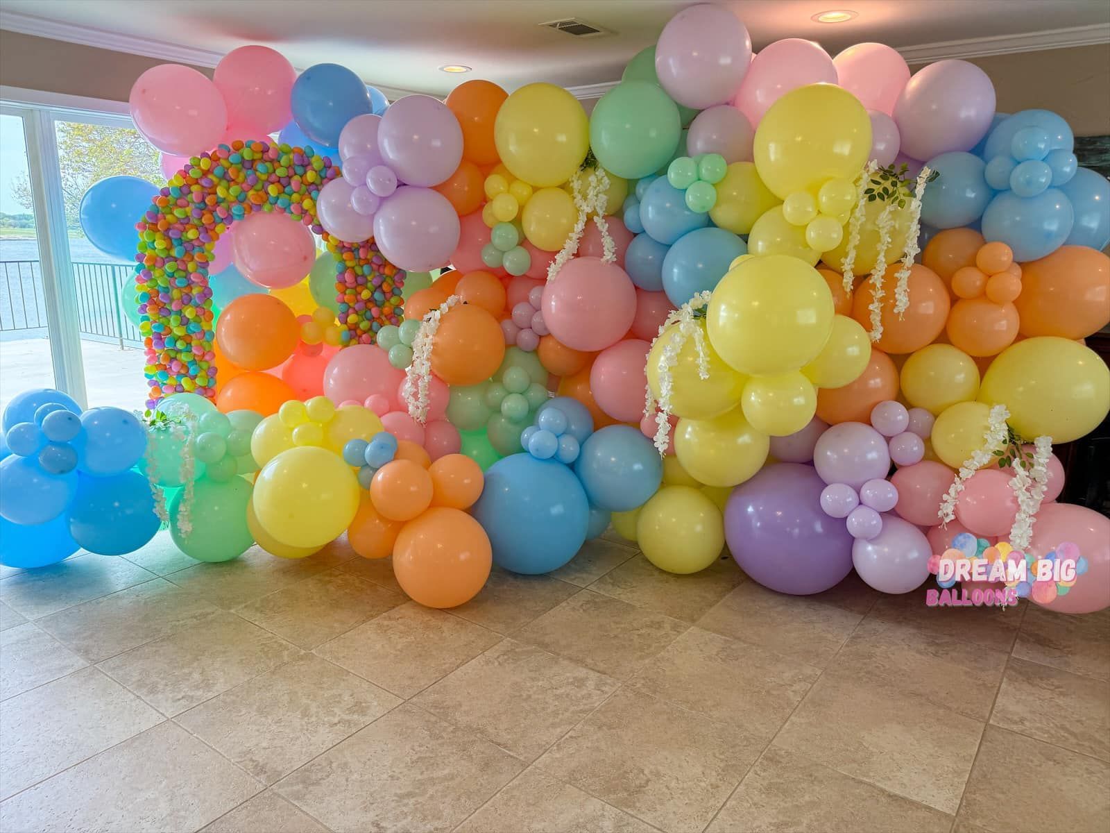 A room filled with lots of colorful balloons.