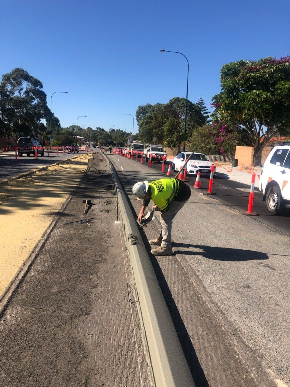 Man repairing new kerb | Perth, WA | Kerb Doctor