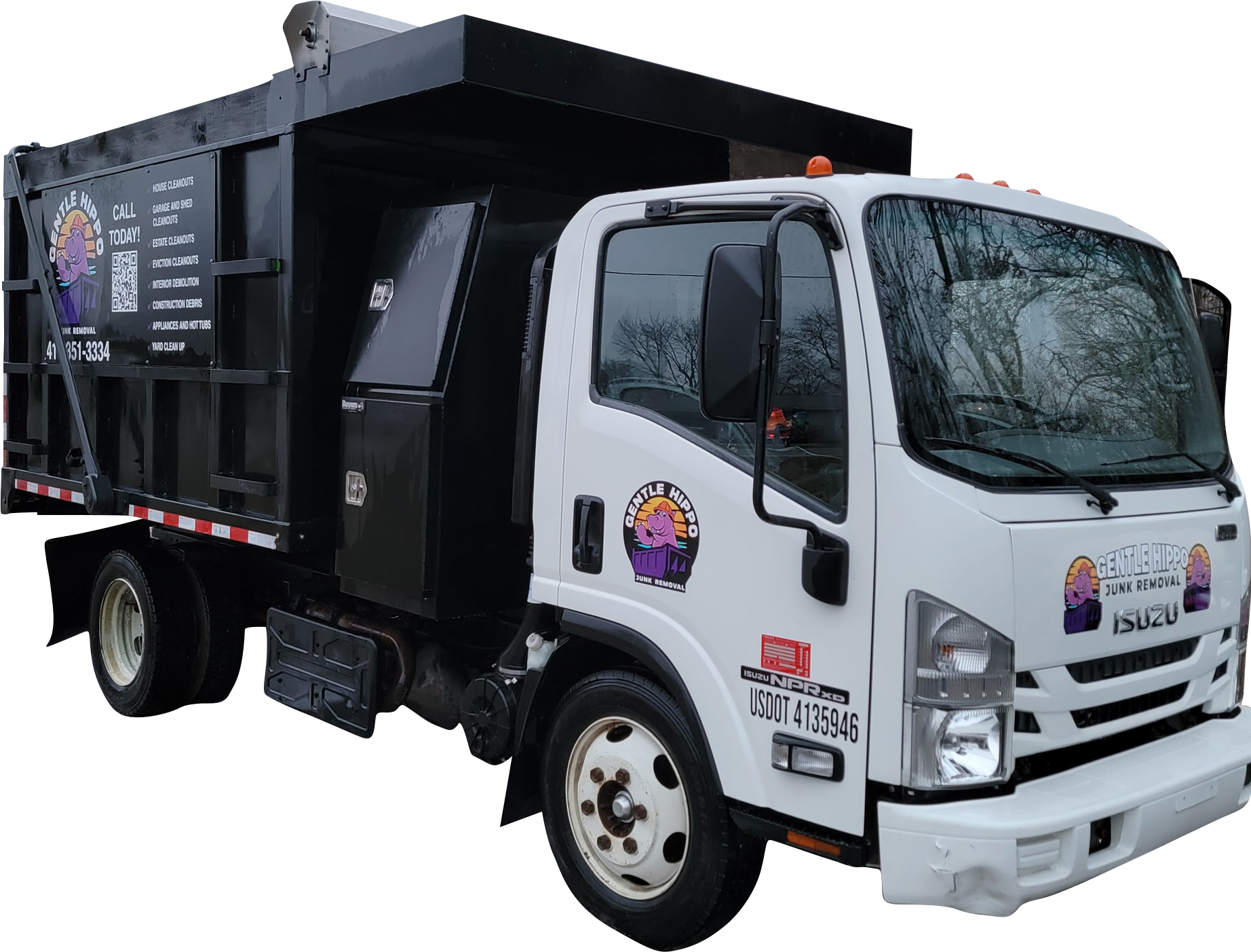 A white dump truck with a black container on the back is parked on a white background.