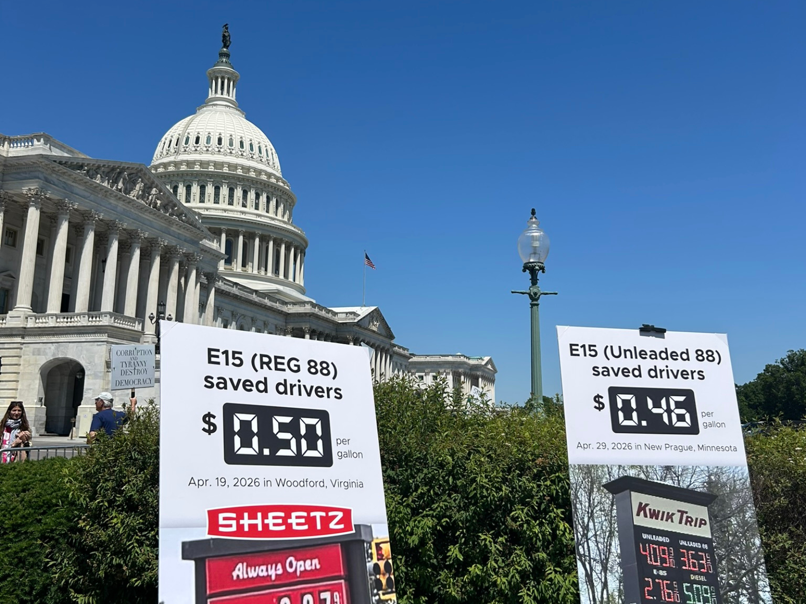 Fuel price signs on the U.S. Capitol lawn with the Capitol dome in the background