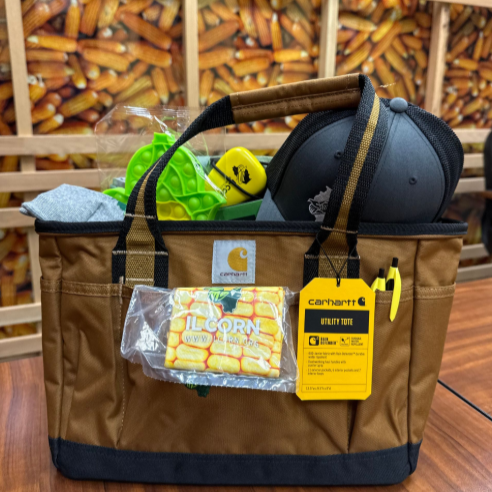 IL Corn giveaway Carhartt tool tote with promotional items corn socks, kernel, pen