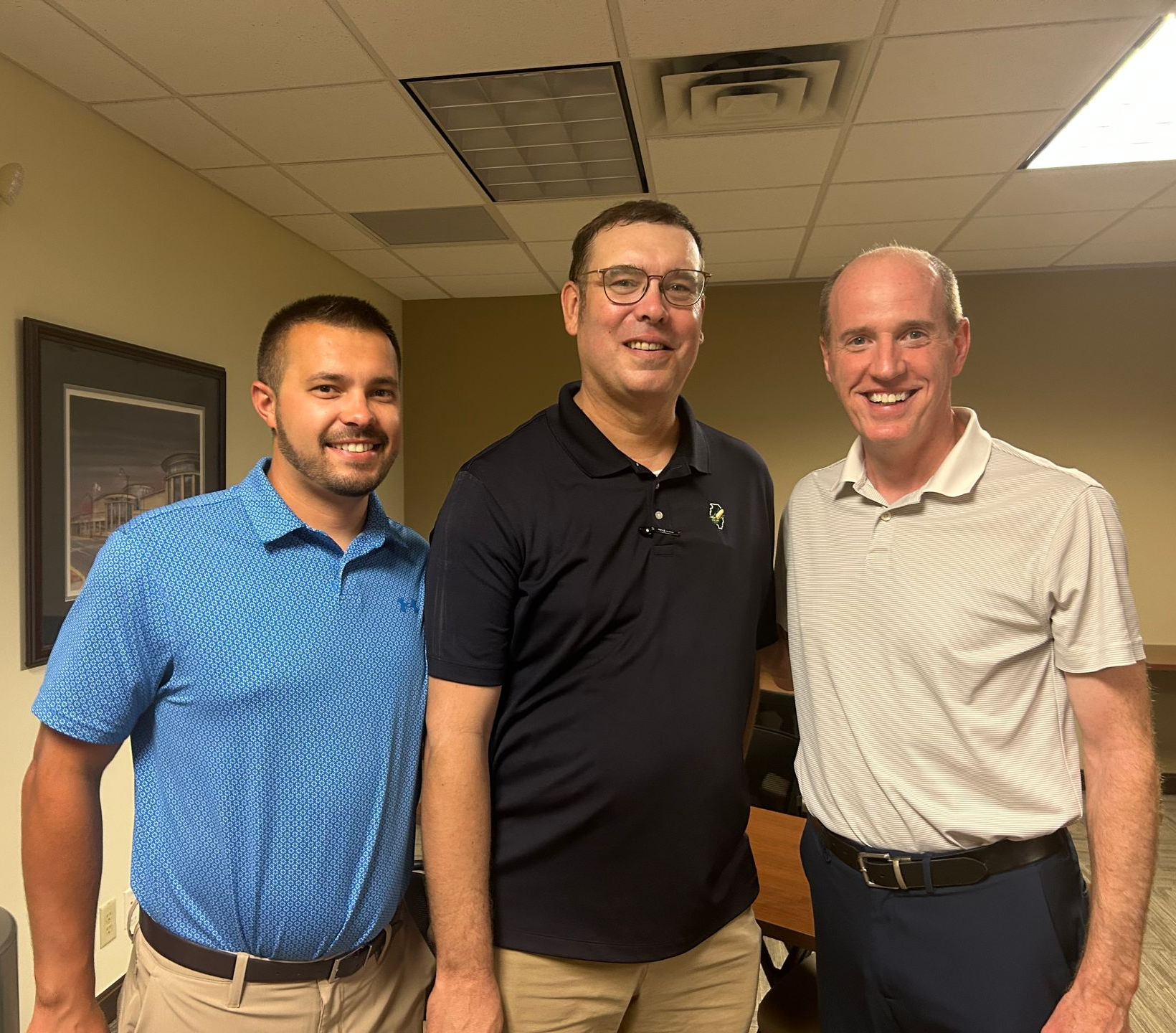 Evan Marr, Mark Bunselmeyer, and Senator Bill Cunningham