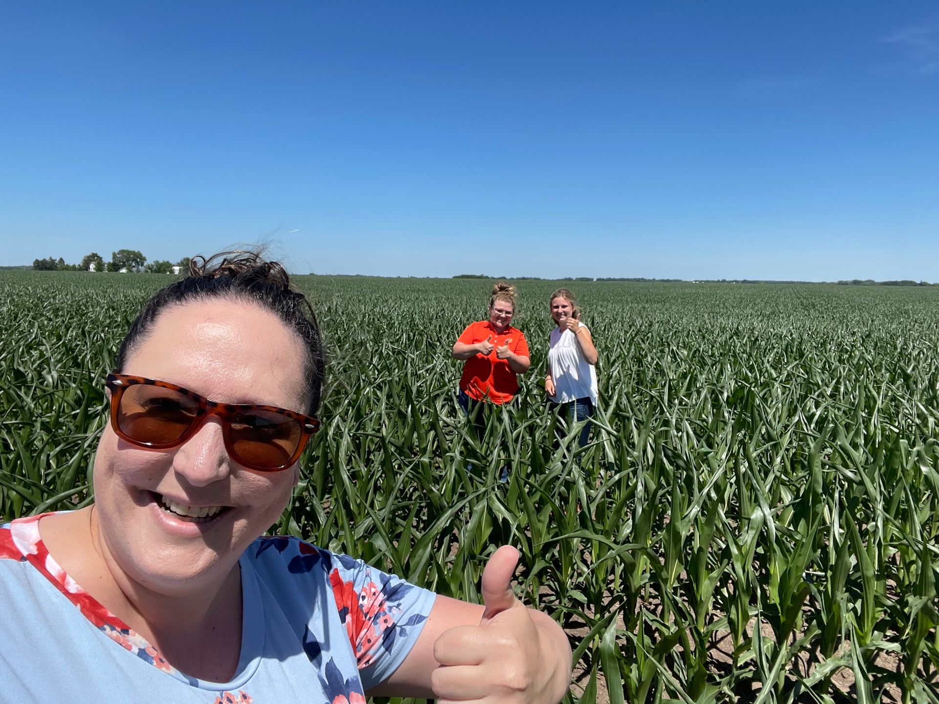 tara in the field with her summer interns