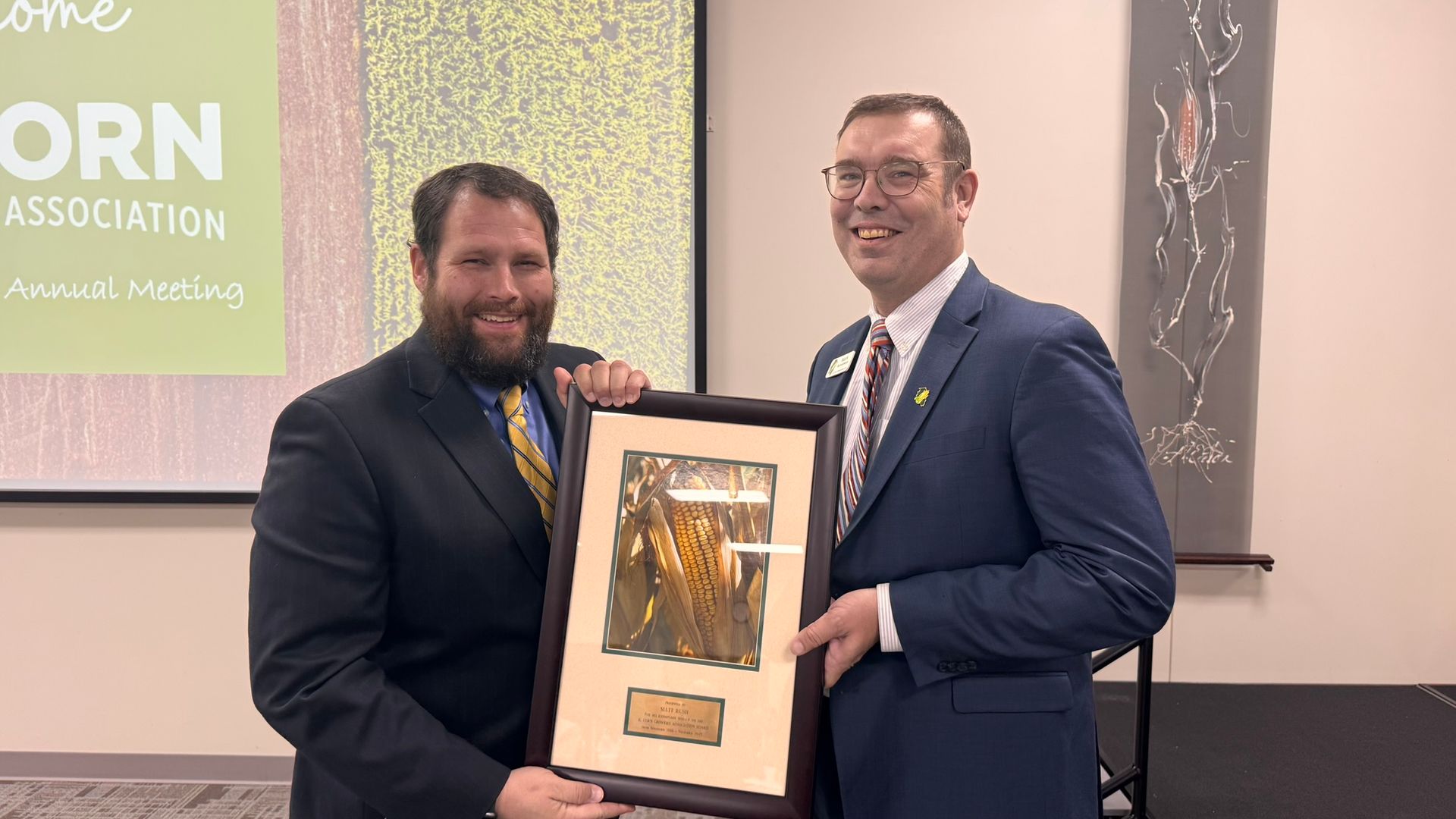 Matt Rush awarded by Mark Bunselmeyer