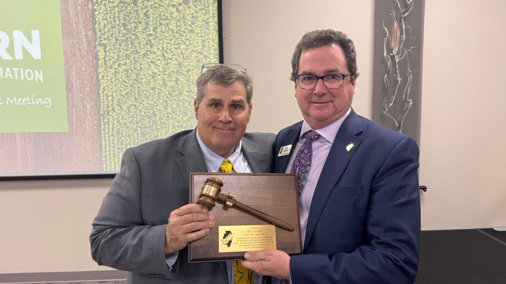 Tim Thompson awarding Jeff Scates