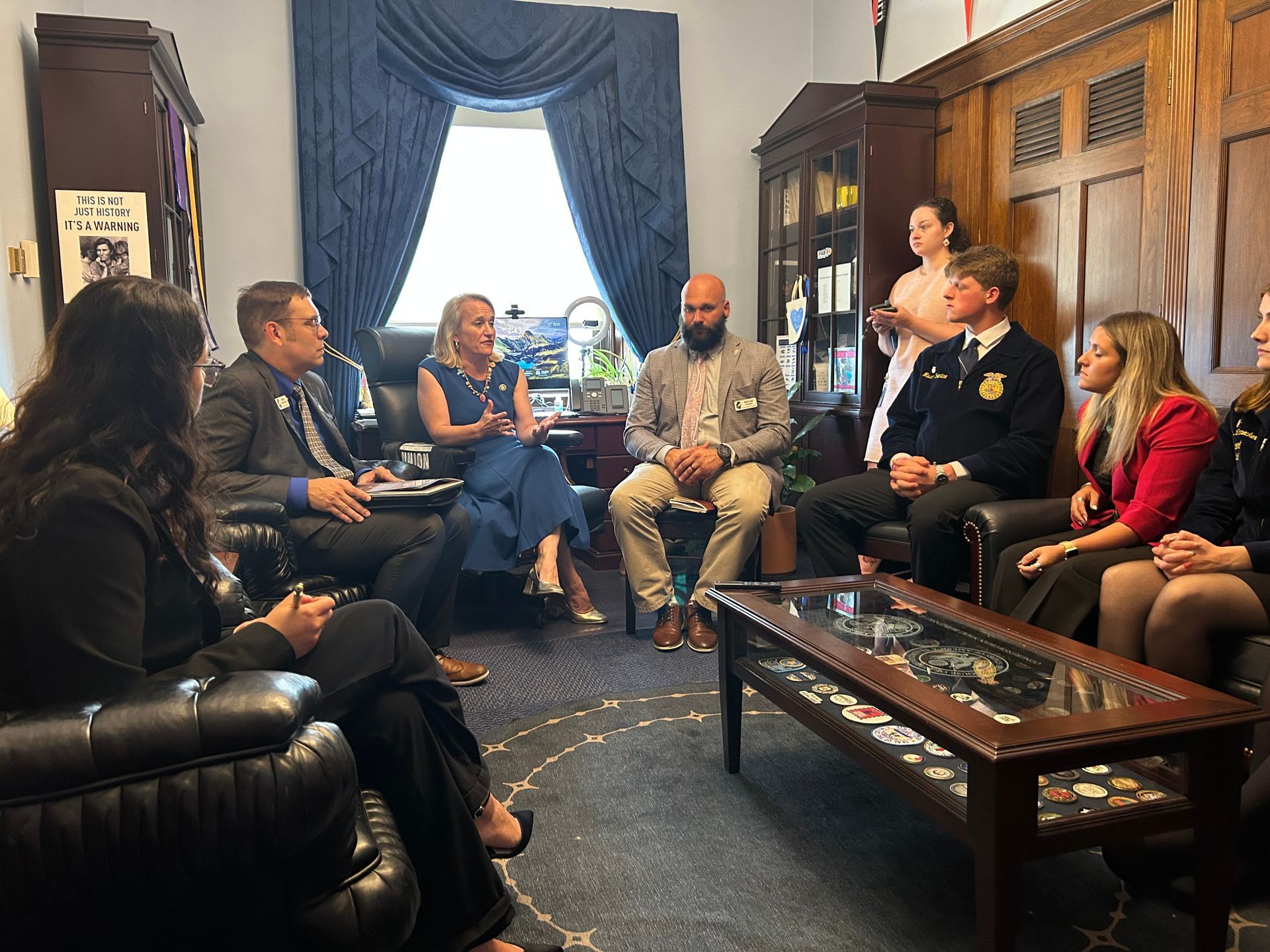 Mark Bunselmeyer, Rep. Nikki Budzinski, Micheal Houston, and Mason Volentine