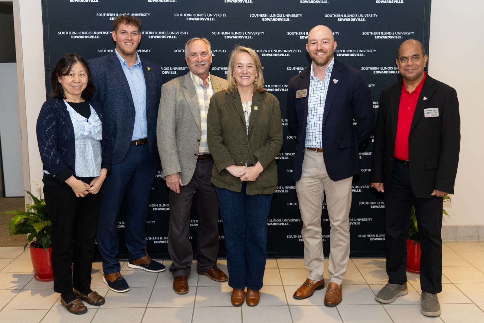 Dr. Yan Zhang, Justin Moore, Rod Weinzierl, Rep. Nikki Budzinski, Dr. Christopher Slaten, and Dr. Pr