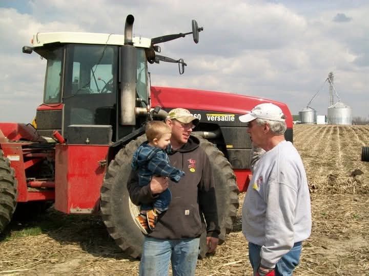 brandon holding ryan talking to his uncle