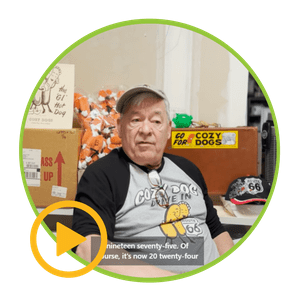 An older man wearing a cozy tune in 66 shirt