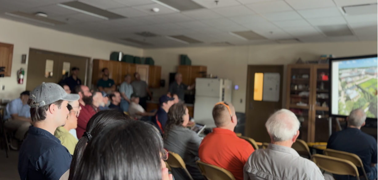 farmer and expert group at Alma Mater Plot day by U of I research plots