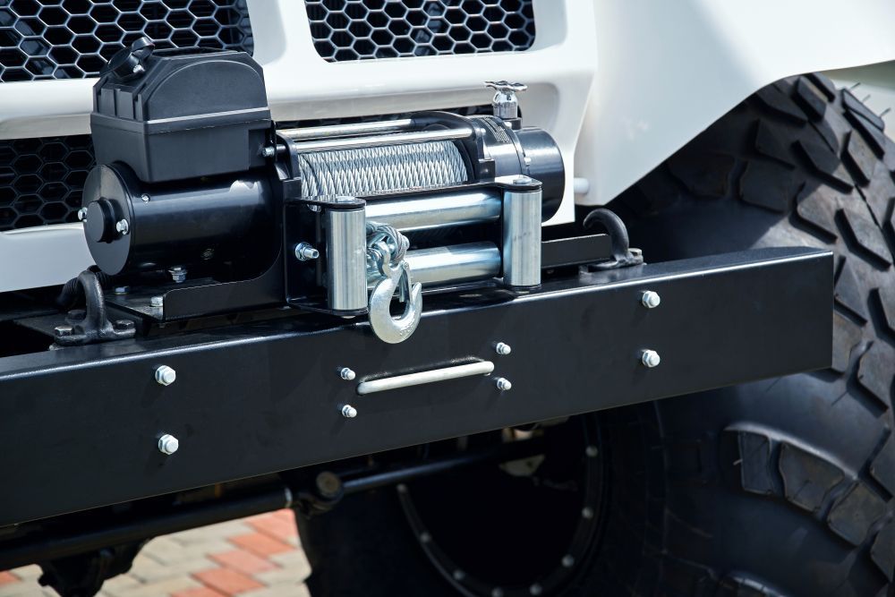 Black Winch Mounted on A Matte Black Bumper  — Erina Mechanical Repairs In Erina, NSW