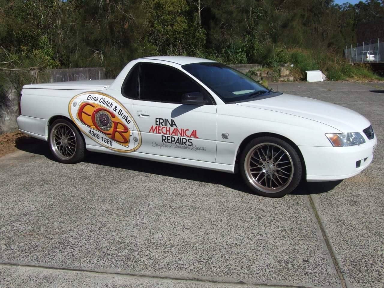White Ute with Mechanic Shop Logo, Parked on Concrete — Erina Mechanical Repairs In Erina, NSW