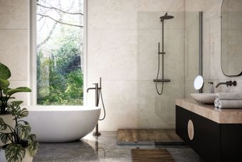 A bathroom with a tub , sink , mirror and shower. A bathroom with a tub , sink , mirror and shower.
