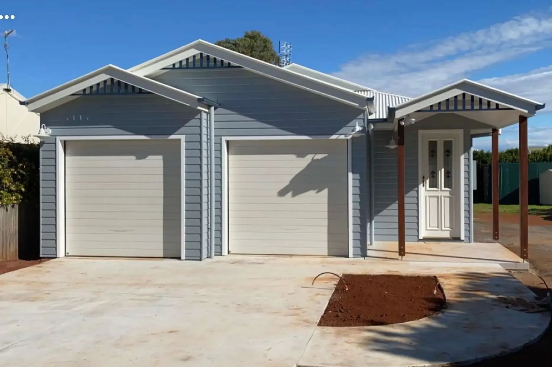 Blue Garage with Two Doors and A Small Covered Entryway — C & S Building In Casino, NSW