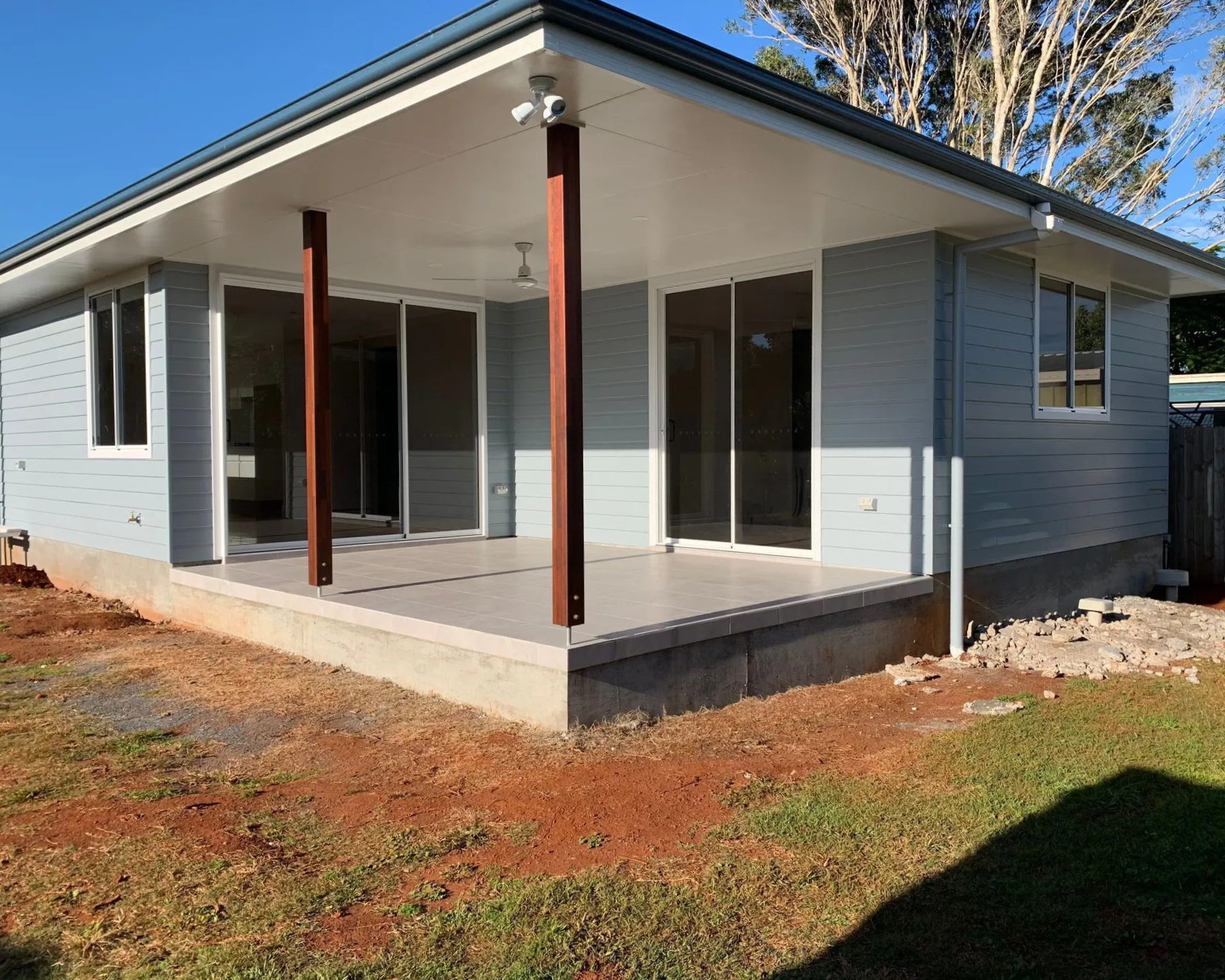 A Newly Constructed House with A Light Blue Exterior — C & S Building In Evans Head, NSW