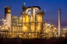 A large industrial plant is lit up at night, project completed by Aarons lighting & Design. 