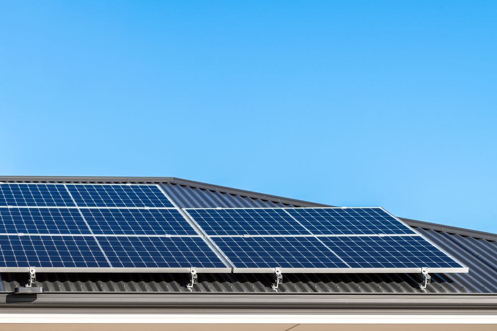 A Kitchen With White Cabinets, Granite Counter Tops — B2B Electrical and Solar In Currimundi, QLD