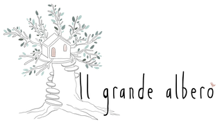Tree with a house on it and the Italian text