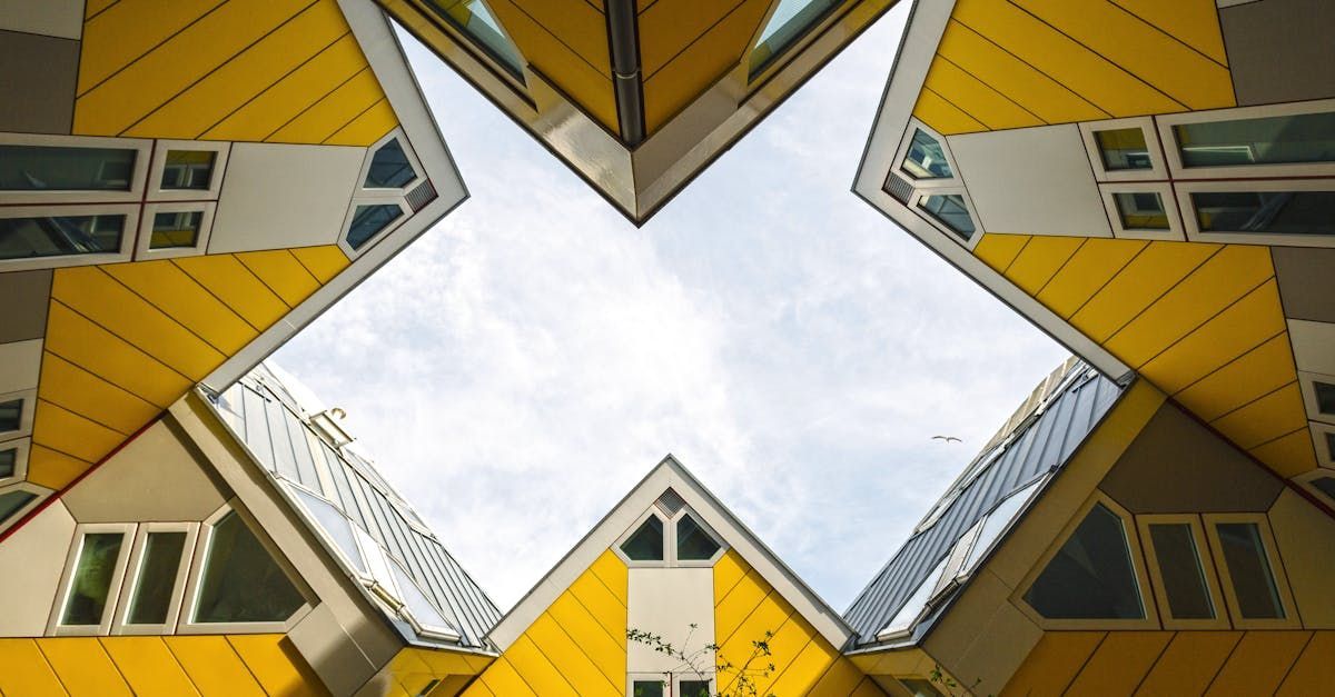latest roof design Looking up at the sky from the inside of a building.