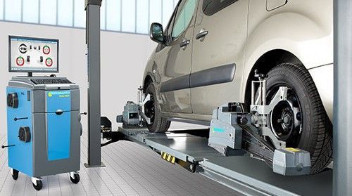 Car on a lift with alignment equipment in a repair shop — Chris Albertini Automotive in North Lismore, NSW