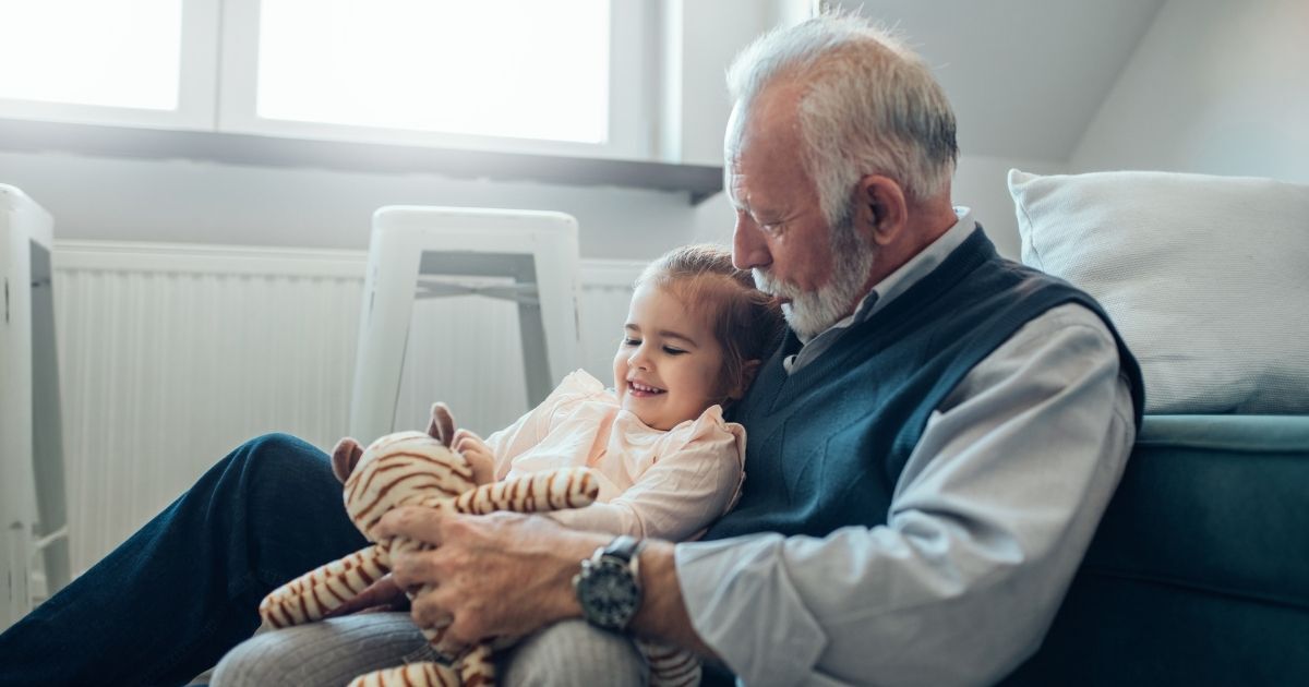 grandpa holding child