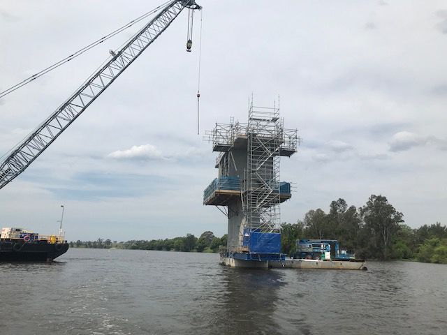 Construction of a Bridge Pillar in River With Crane and Scaffolding — NRS Scaffolding Pty Ltd in Harrington, NSW