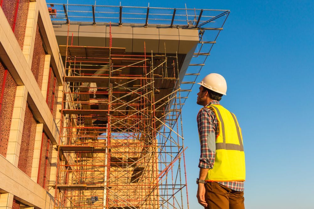 A Large Scaffolding Tower is Being Lifted by a Crane — NRS Scaffolding Pty Ltd in Clifden, NSW