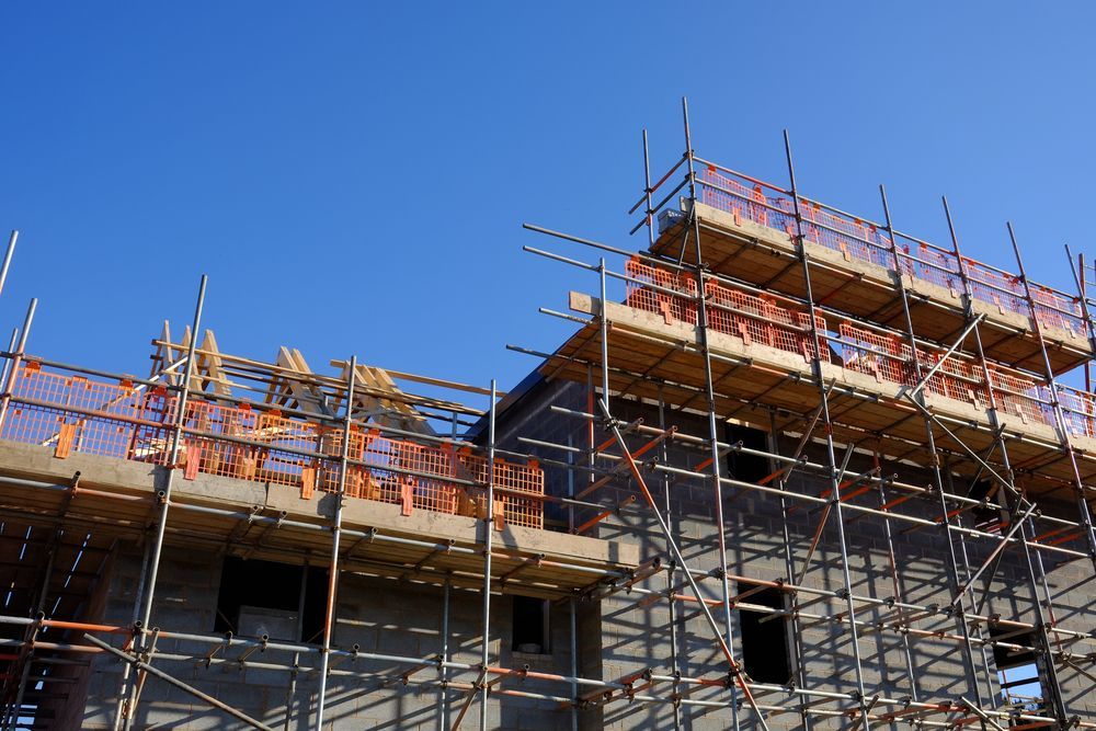 Construction Site With Scaffolding and a Building Under Construction — NRS Scaffolding Pty Ltd in Wauchope, NSW