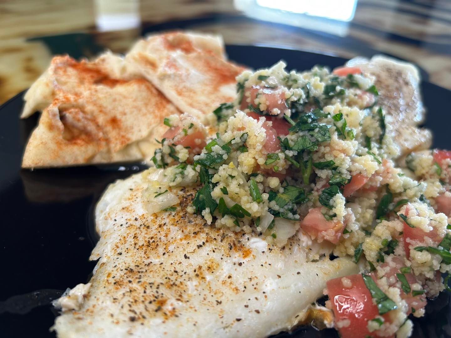 Broiled Haddock topped with tomato and spinach