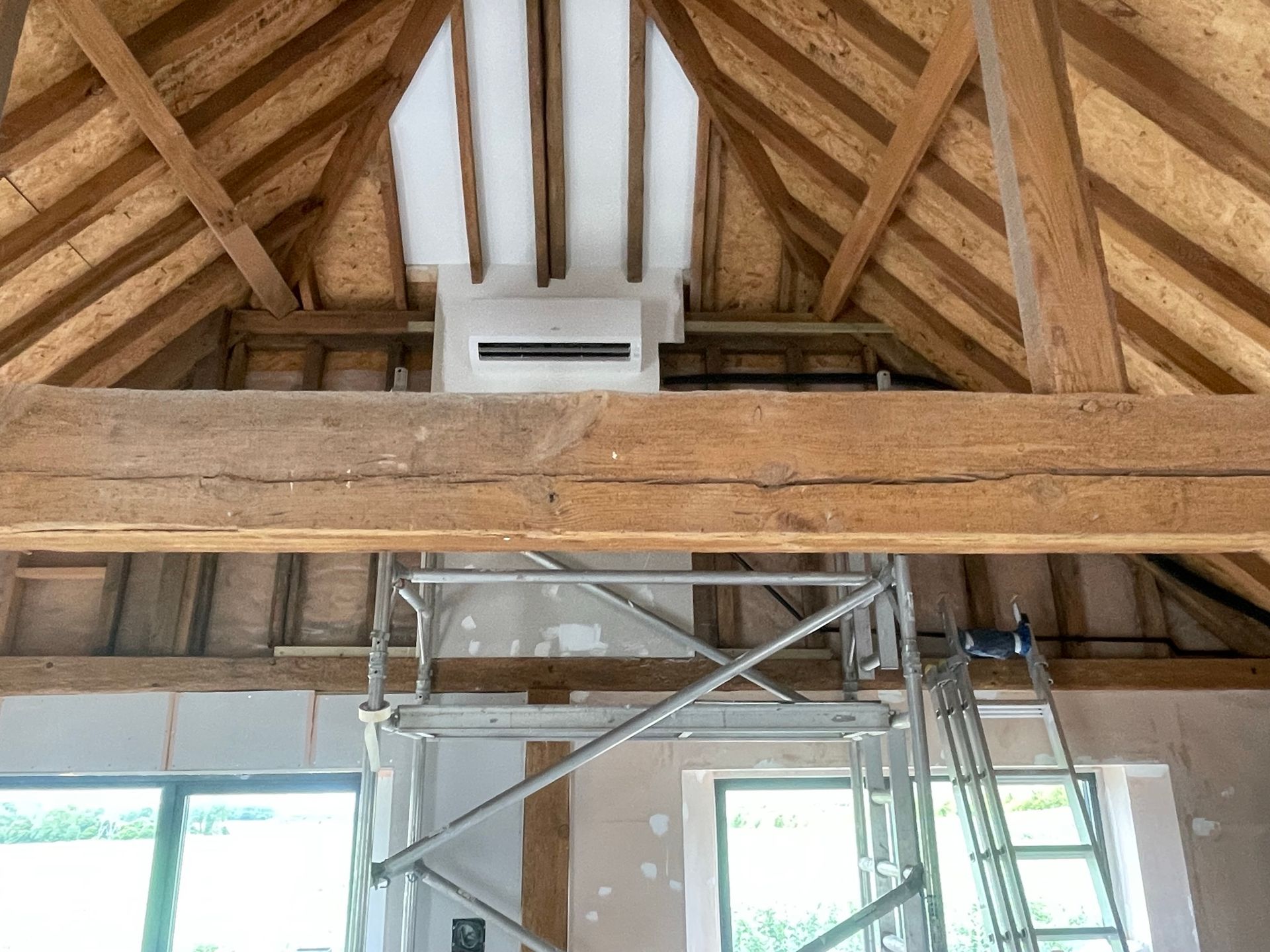 Mitsubishi Electric wall mount installed with pipework running inside the walls