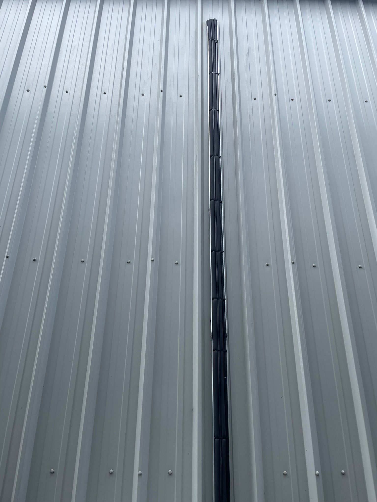 Commercial install - neat services secured to tray down to condenser.