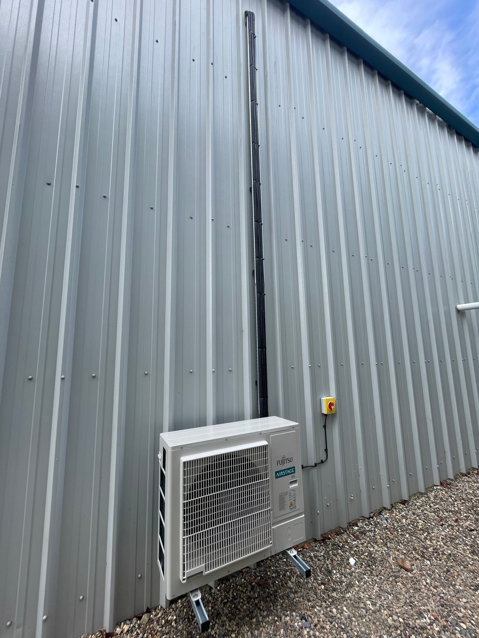 Commercial install - neat services secured to tray down to condenser.