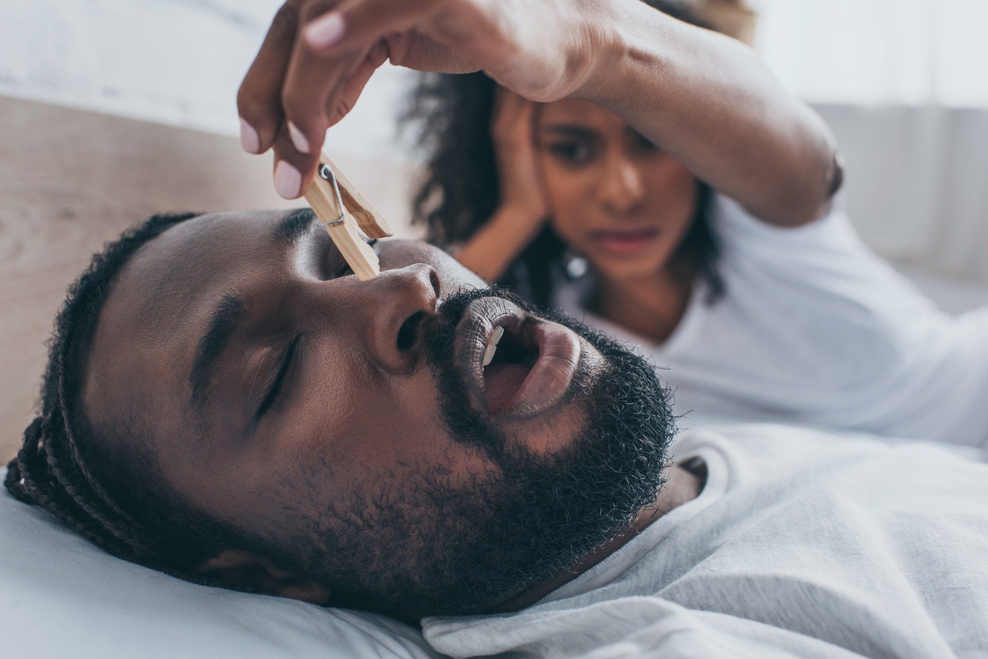 woman with healthy gums and teeth having a dental exam