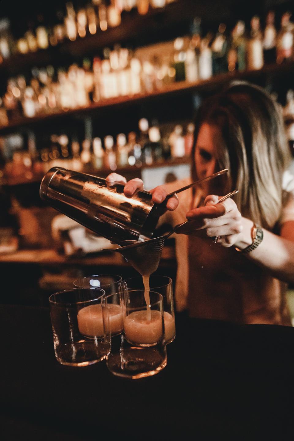 woman making a drink