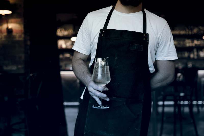 waiter bring drink at Finney Isles