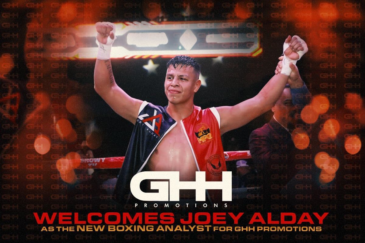 Joey Alday raises his arms in a red-and-black boxing ring, with “Welcome Joey Alday” text below.