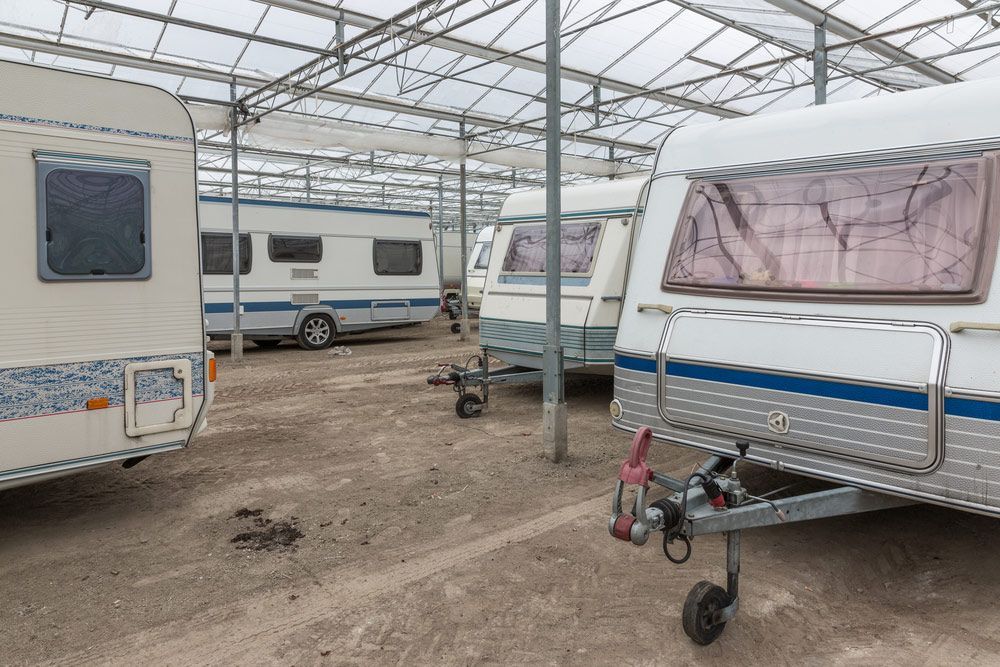 Caravans Are Parked In A Greenhouse — Hunter Valley Caravan Storage in North Rothbury, NSW
