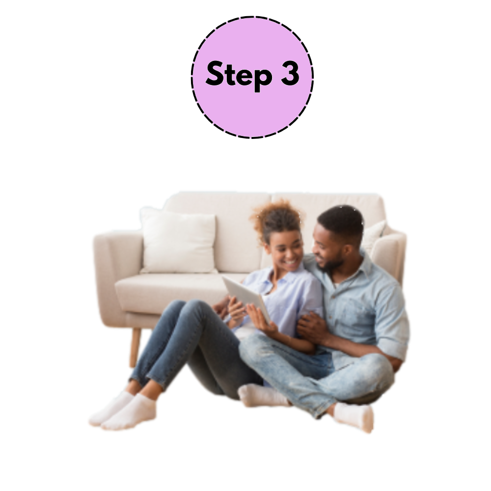 Step 3: couple sitting on the floor in front of a beige sofa, looking at a tablet.