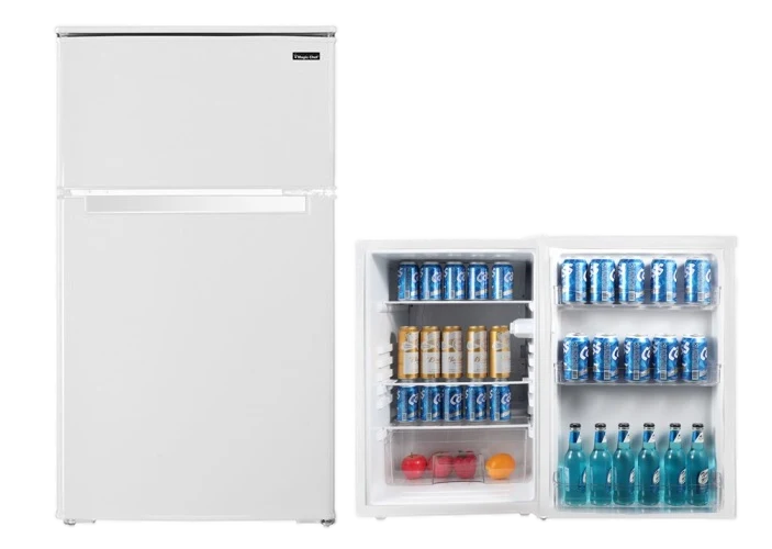 White top-freezer refrigerator beside an open mini-fridge stocked with drinks and snacks