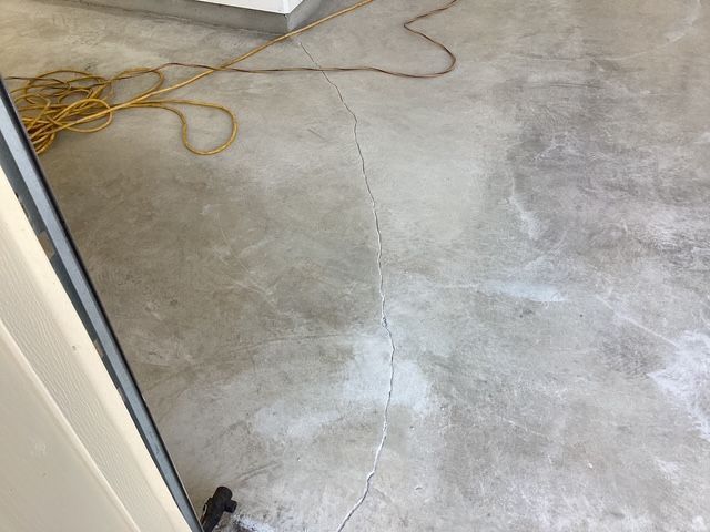 Concrete floor preparation for epoxy coating
