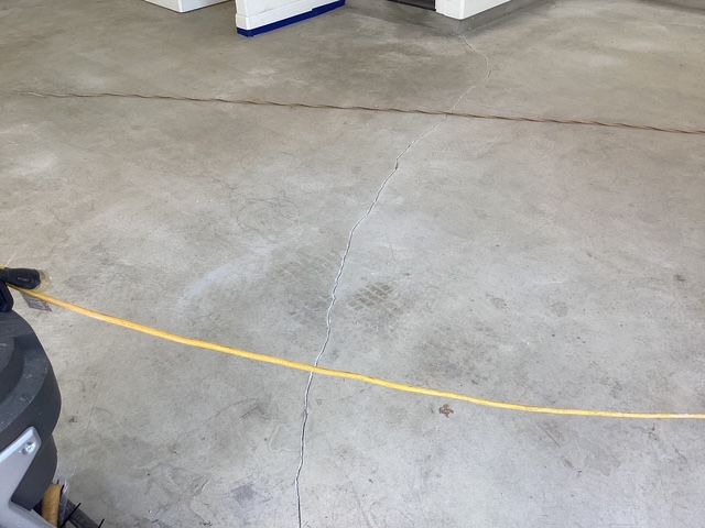 Concrete floor preparation for epoxy coating