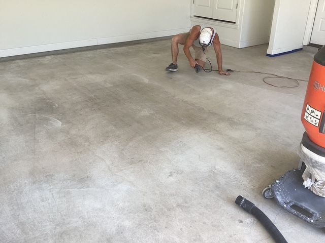 Concrete floor preparation for epoxy coating