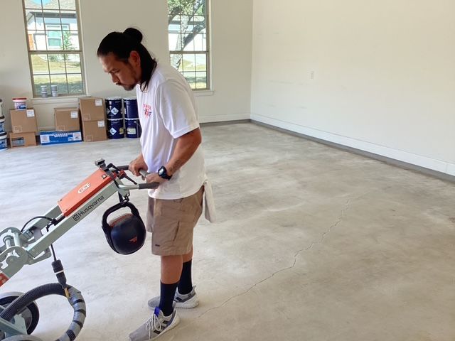 Concrete floor preparation for epoxy coating