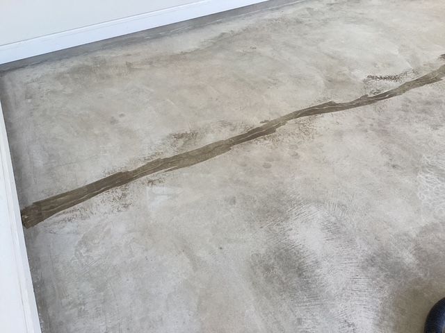Concrete floor preparation for epoxy coating