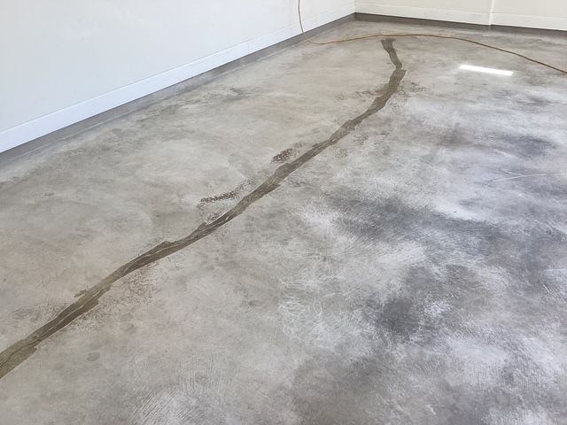 Concrete floor preparation for epoxy coating