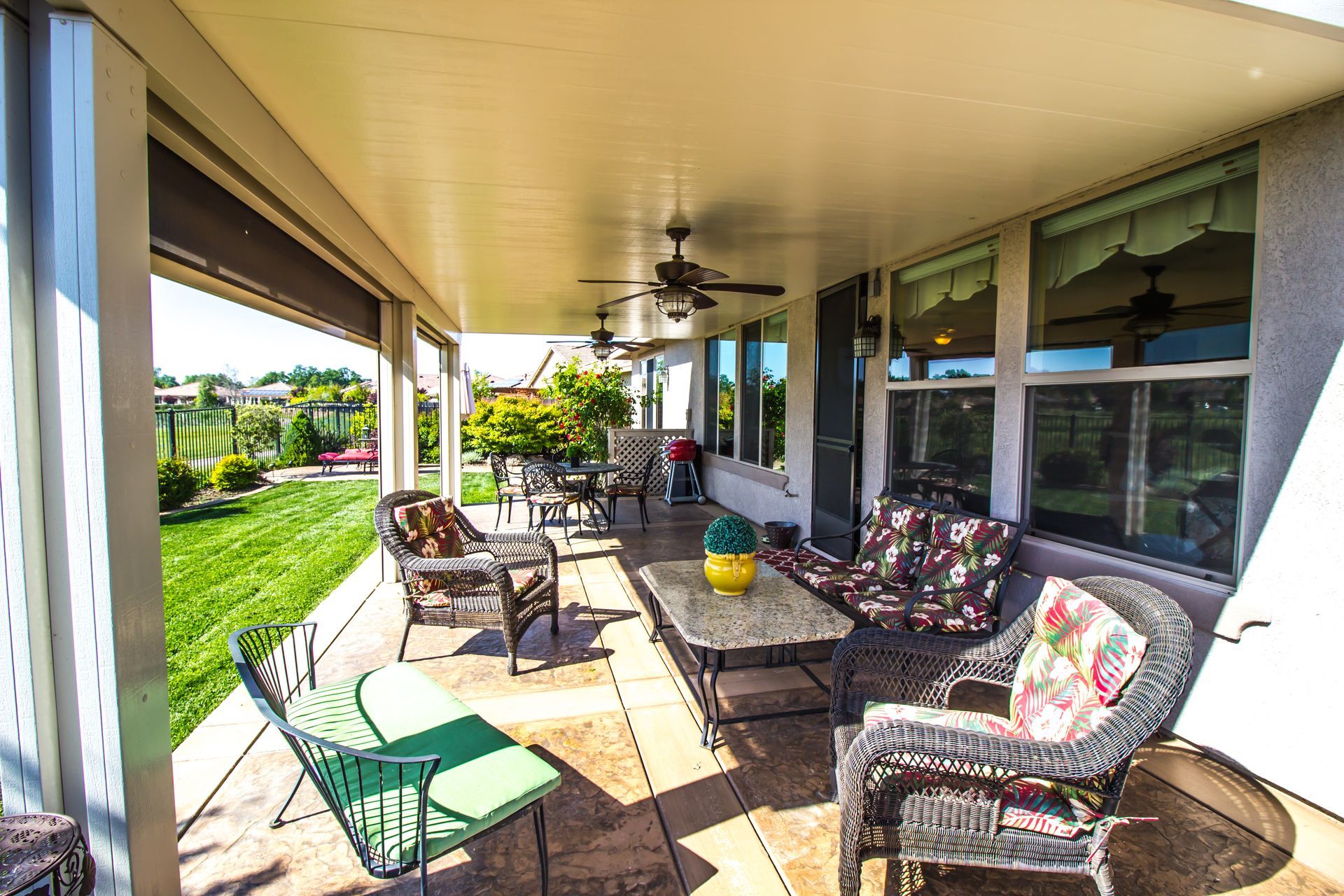 Motorized outdoor shades on a covered porch near Denton, TX.