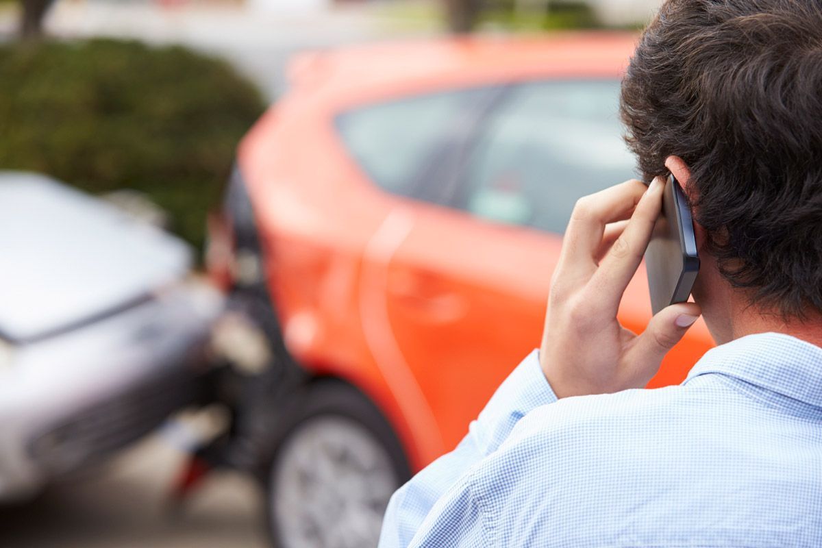 Man Making Phone Call After Traffic Accident — Tacoma, WA — Vail, Cross-Euteneier & Associates
