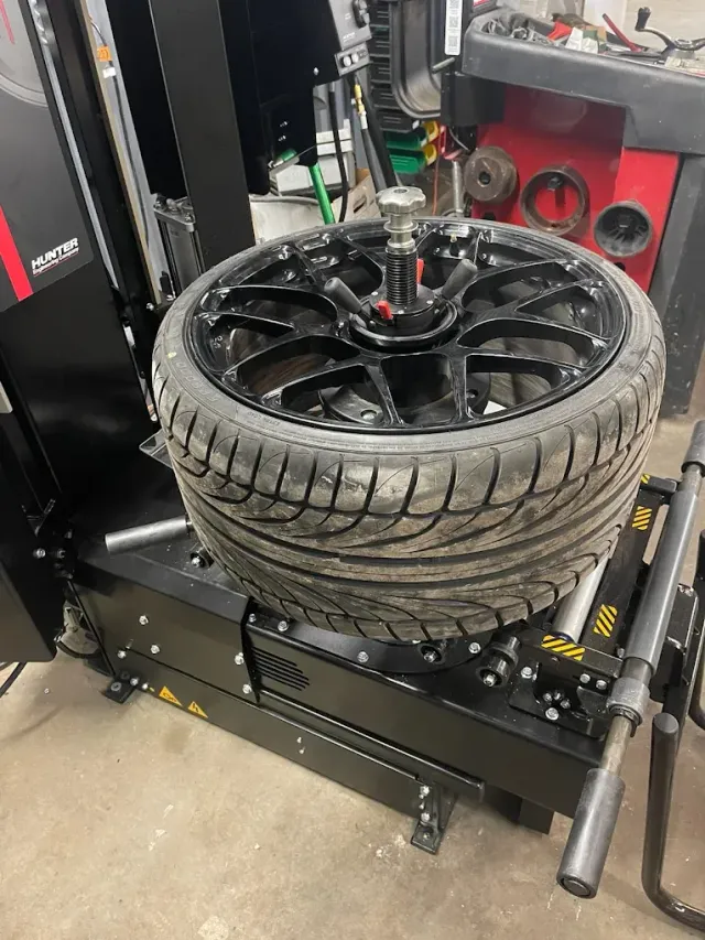 Tire Being Fixed | Cutting Edge Automotive LLC