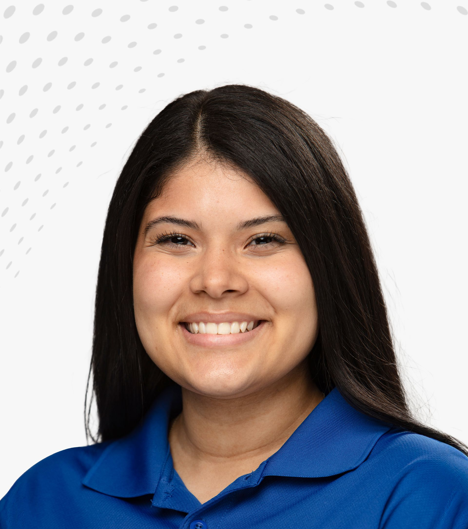 Smiling person in a blue Sifted polo shirt against a light background