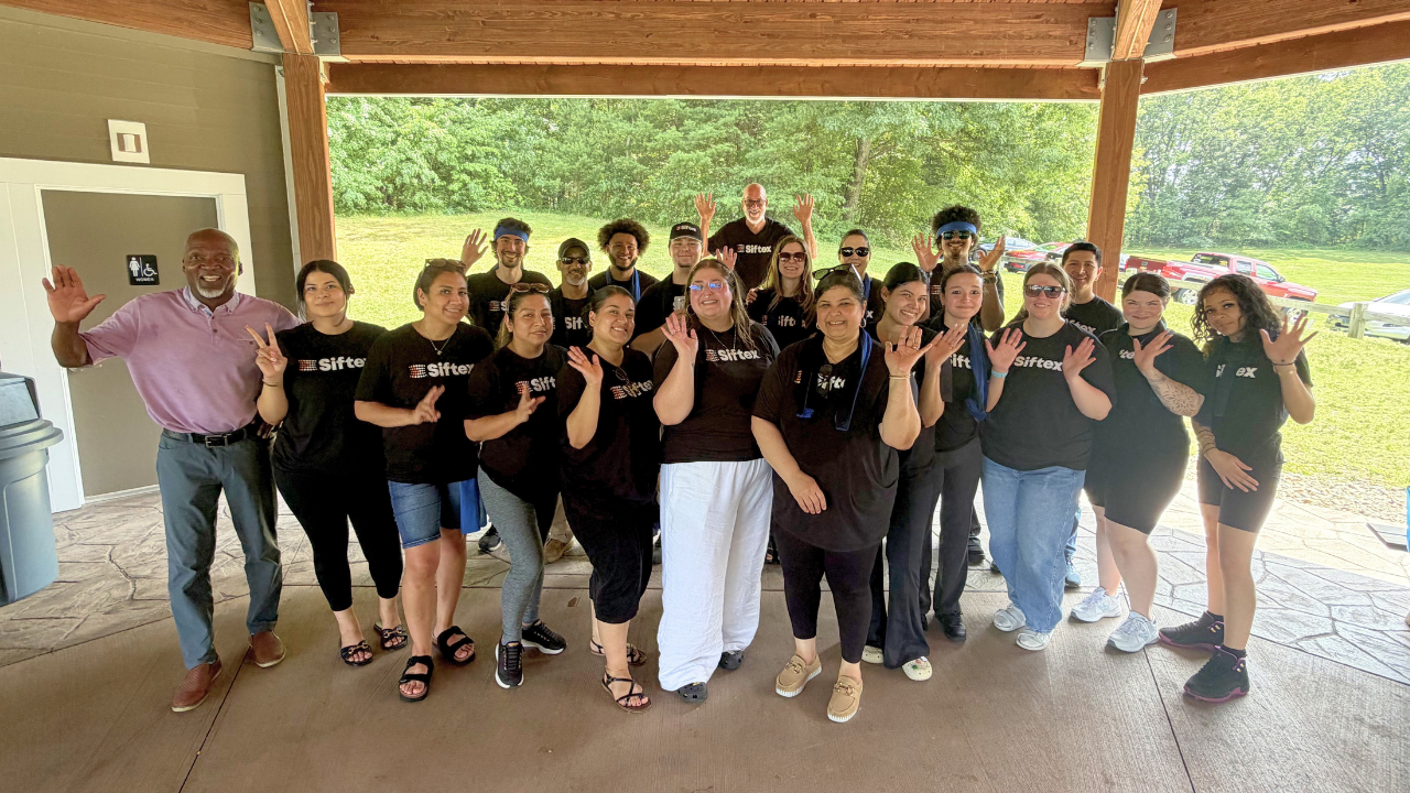 Siftex team celebrating at the annual company picnic in South Windsor, CT